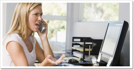 Angry woman on the phone with debt collector